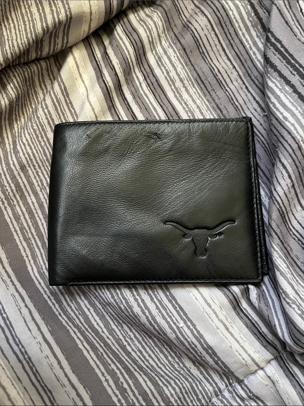 Men's Black Leather Bi-Fold Wallet with Embossed Longhorn